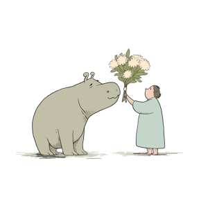 A person offering flowers to a friendly-looking hippopotamus.
